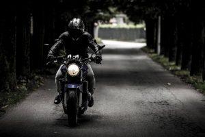 motorcycle rider cruising city streets