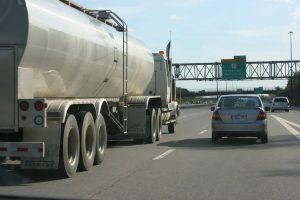 car passing a truck, personal injury