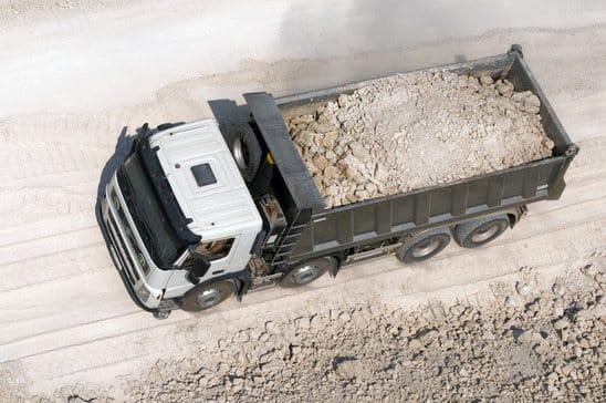 large truck loaded with dirt and rocks