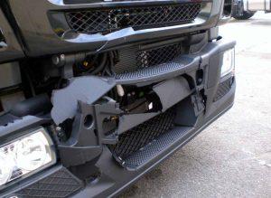 front end damage to a truck after an accident