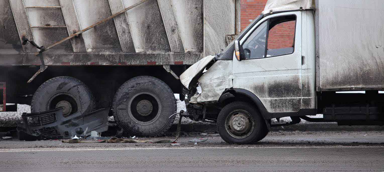 damage to two trucks after an accident