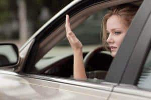 a female driver showing anger to another driver