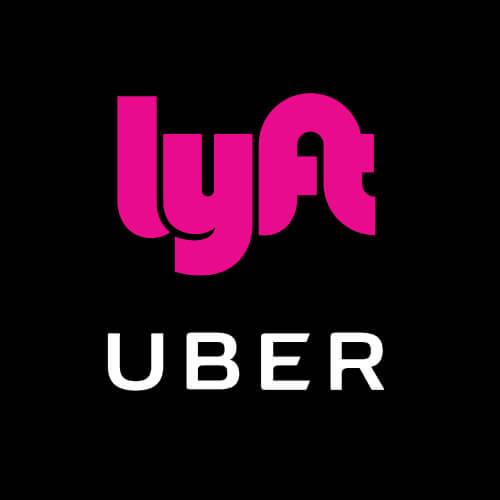 lyft and uber logos on black background