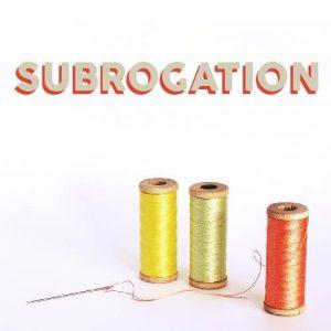 subrogation text on photo of three spools of thread and a needle