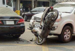 motorcycle collided with passenger car