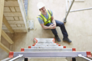 construction worker falls off ladder and hurts leg