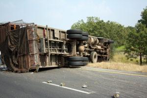 overturned truck on highway after accident