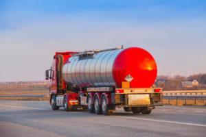 gasoline tanker driving down highway