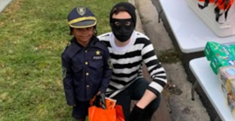 Trunk or Treaters dressed up as policeman and masked bandit.