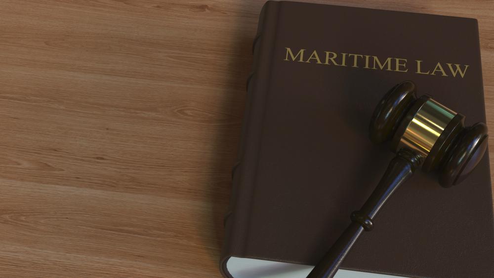 maritime law book with gavel