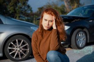 woman in distress after a car accident