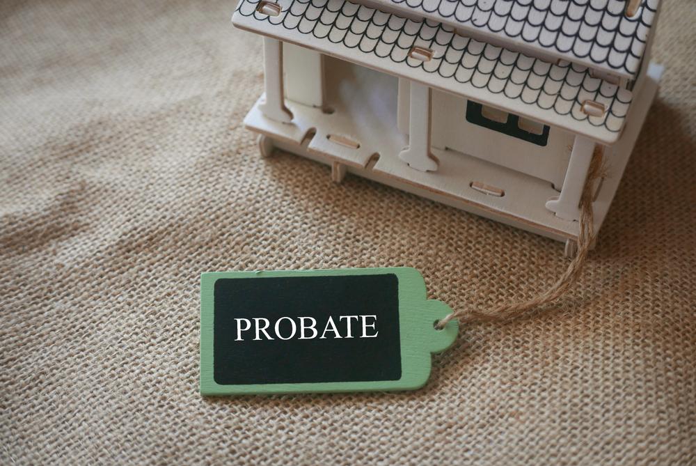 wooden house with probate tag