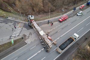 aerial view of overturned truck blocking traffic