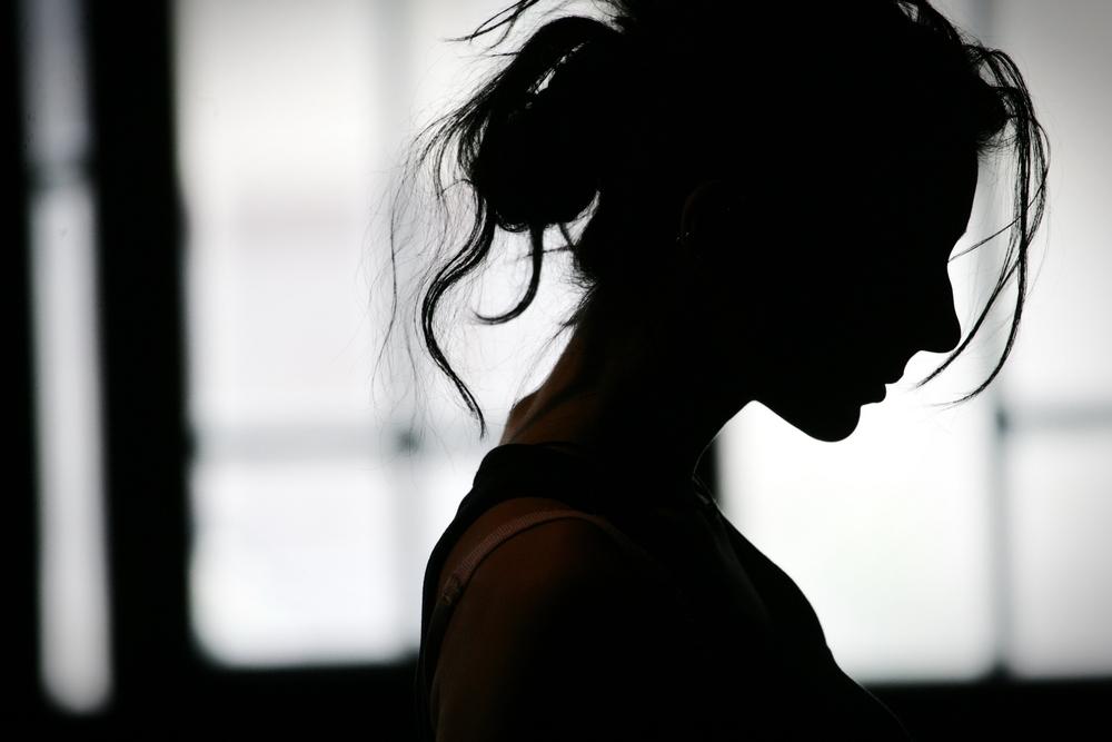 woman in dark silhouette